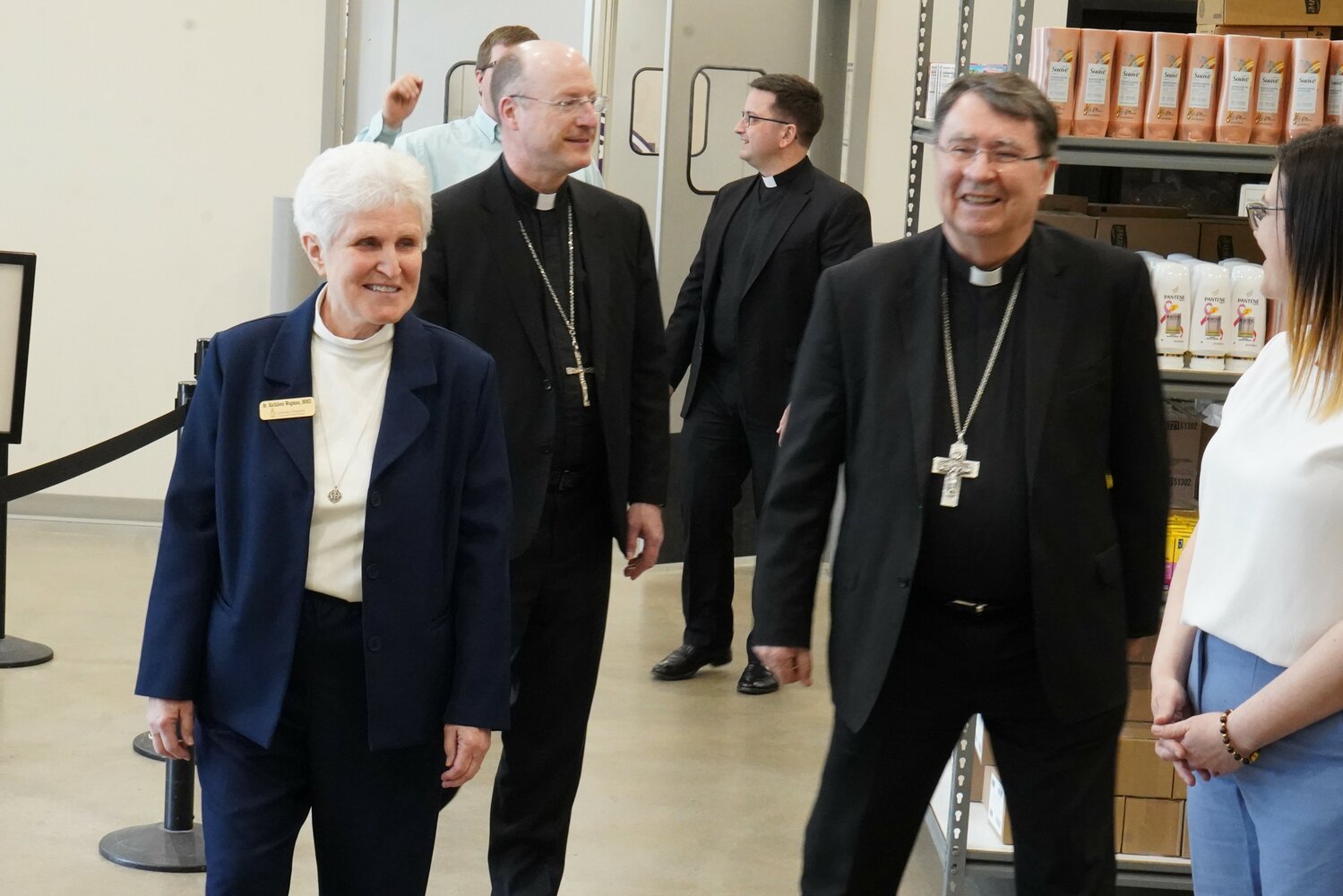 Archbishop Christophe Pierre, right, apostolic nuncio to the United States, tours Catholic Charities of Central and Northern Missouri’s (CCCNMO’s)Client Choice Food Pantry in Jefferson City on May 4, with Sister Kathleen Wegman SSND, CCCNMO interim executive director, and Bishop W. Shawn McKnight. Six weeks later, Archbishop Pierre mentioned what he saw in an address to the U.S. Catholic bishops.